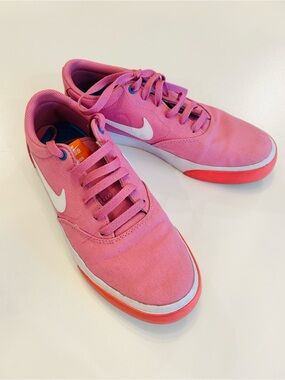 Nike Pink Canvas Sneakers with White Swoosh and Coral Sole Trim